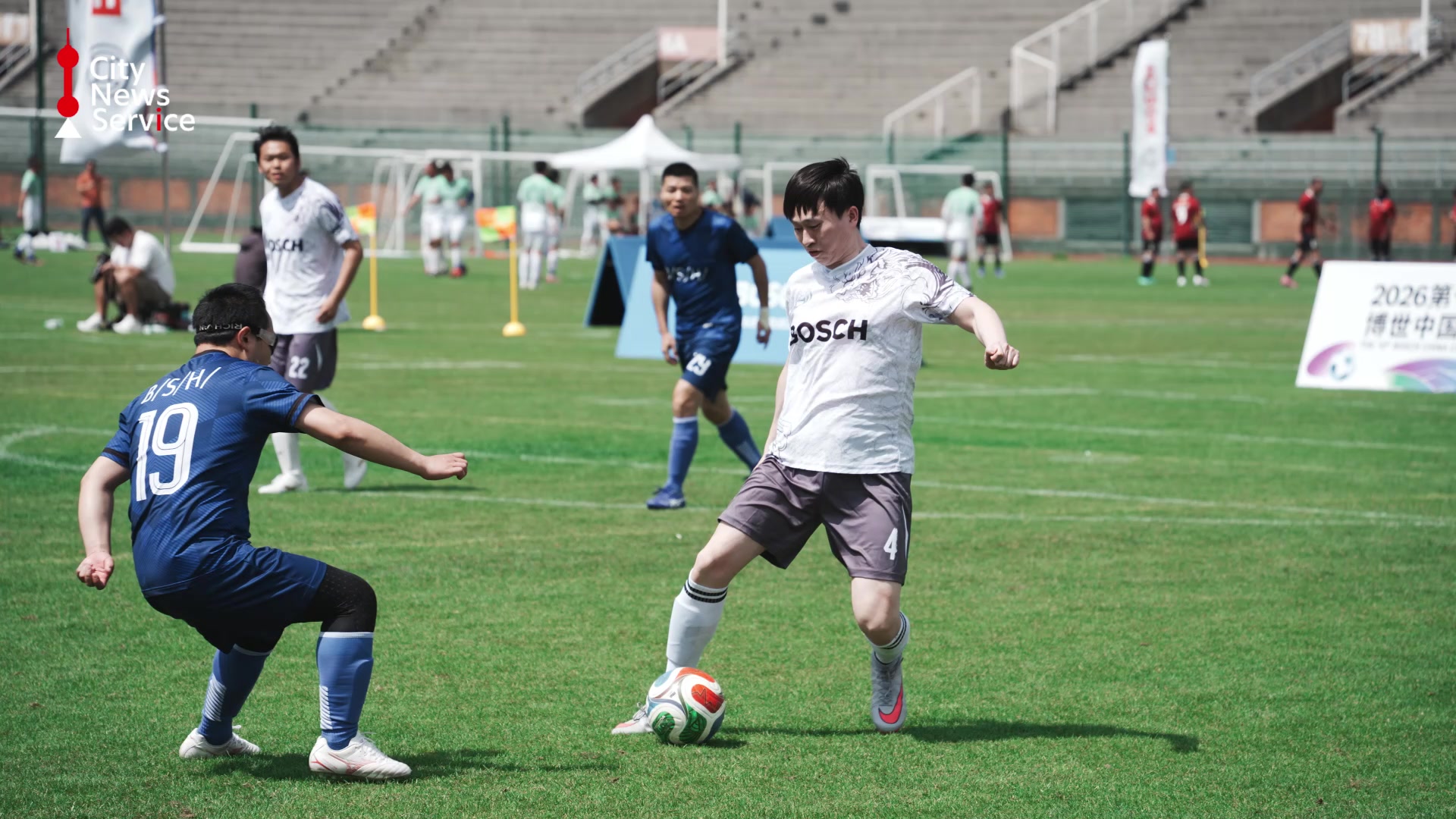 Charity match raises US$11,444 for football program in Yunnan